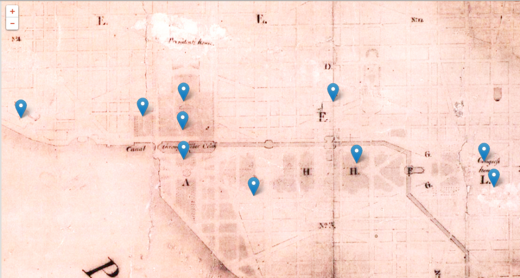 An aged map with faint boundary lines and streets. Blue pinpoints have been superimposed.